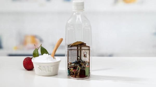 Adorable Japanese Drink Ad Features A Miniature Kitchen Inside A Plastic Bottle